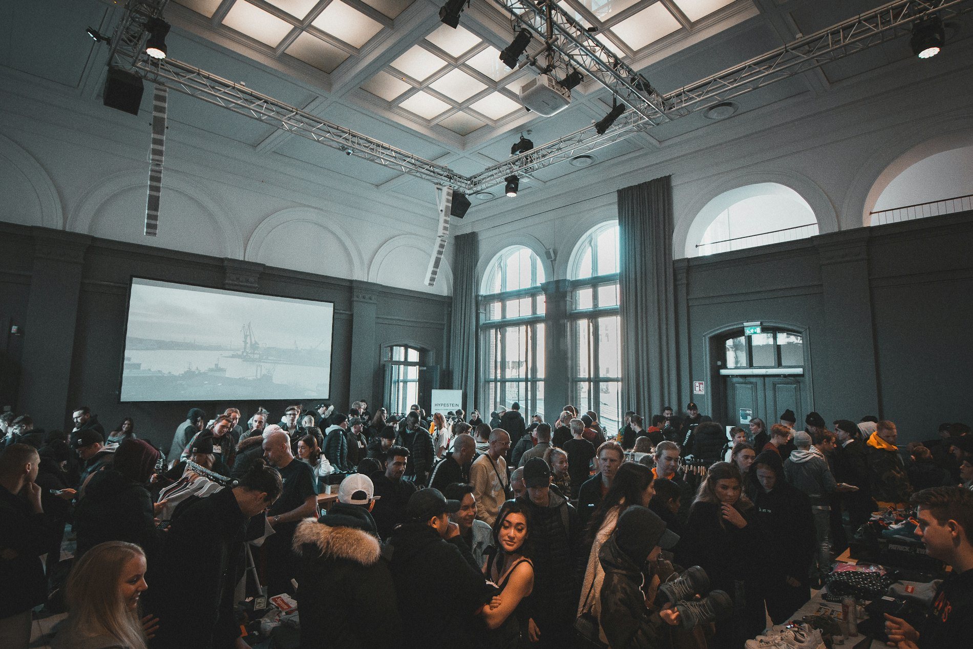 Interior of a gallery hall with high windows